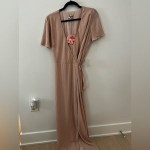Show Me Your Mumu bridesmaid dress in Dusty Blush Crisp. Wrap dress style.